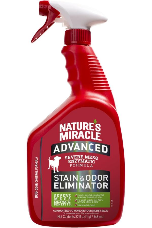10 Essential Items Every Pet Owner Needs In Their Cupboards When Disaster Strikes 3 Red spray bottle of Nature’s Miracle Advanced Stain and Odor Eliminator for severe pet messes, a trusted cleaning essential among Items Every Pet Owner Needs.