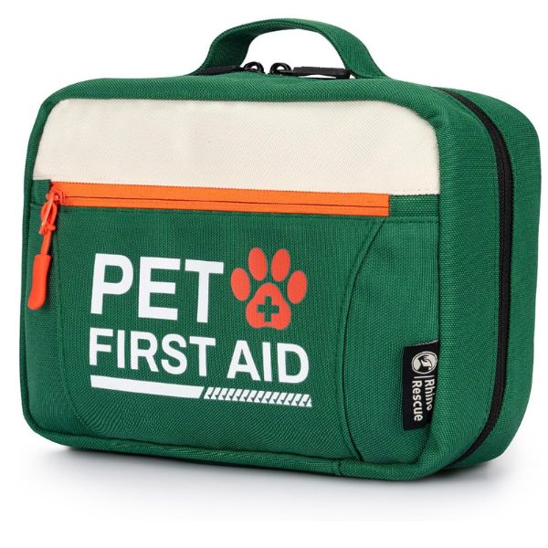 10 Essential Items Every Pet Owner Needs In Their Cupboards When Disaster Strikes 2 A green pet first aid kit bag with an orange zipper, labeled “Pet First Aid,” which is an important inclusion in Items Every Pet Owner Needs for emergencies.